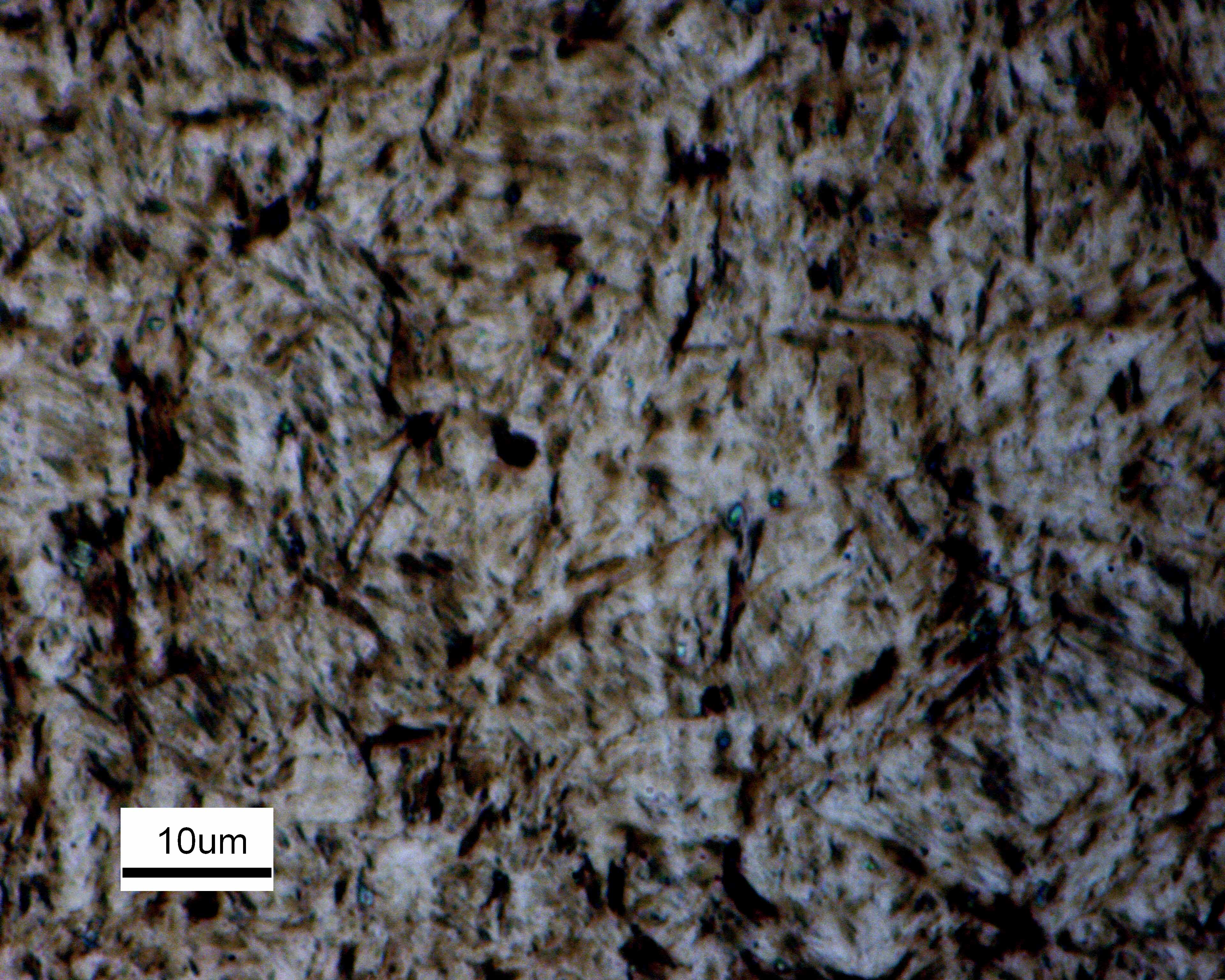Optical micrograph of martensite in oil-quenched AISI 4140 steel.